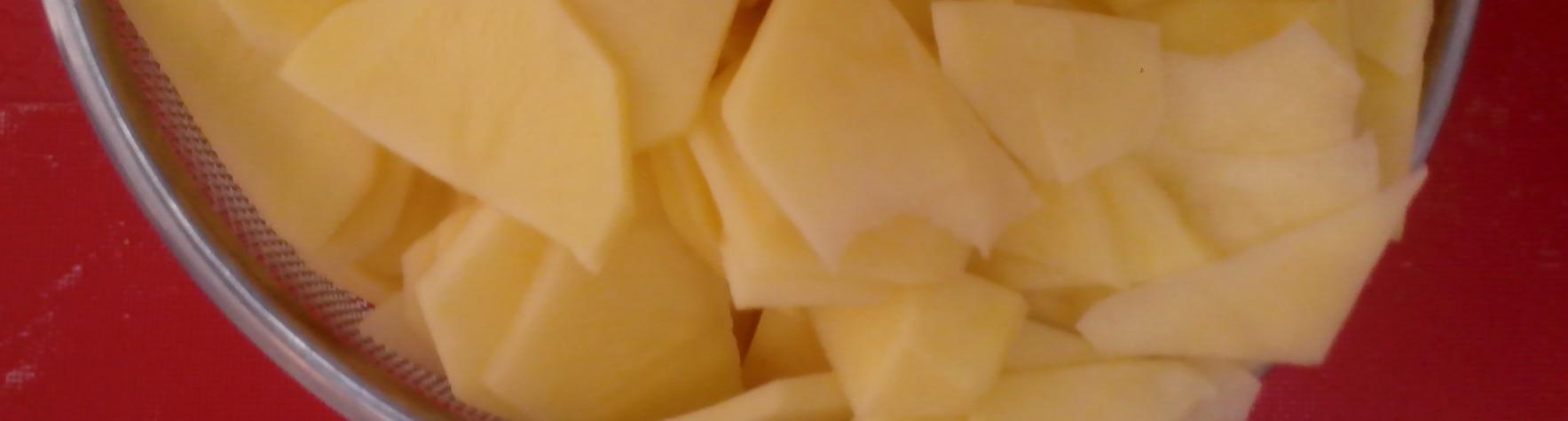 Patatas cortadas en rodajas